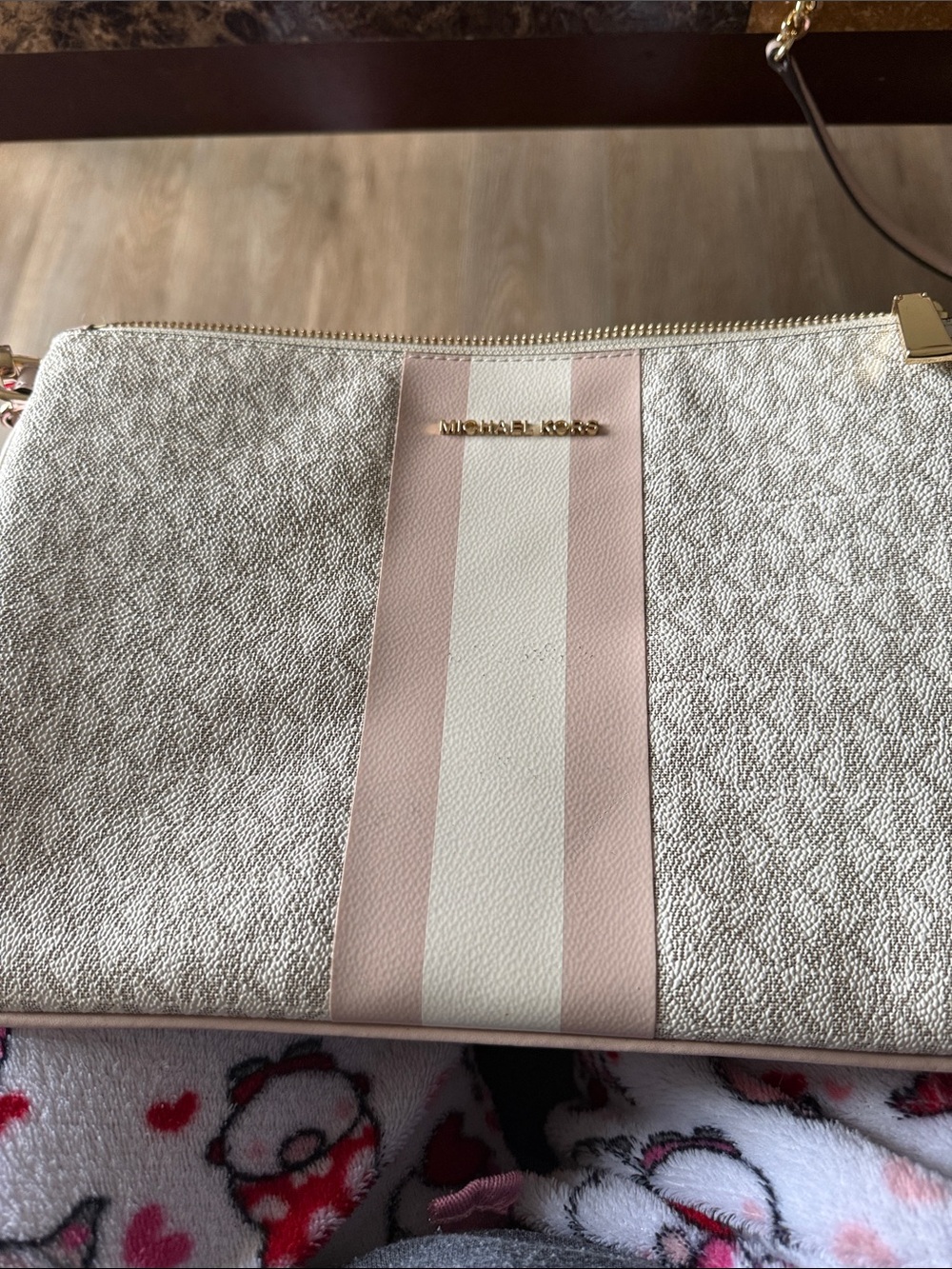 MICHAEL KORS Pale Pink and White Striped Wristlet Clutch